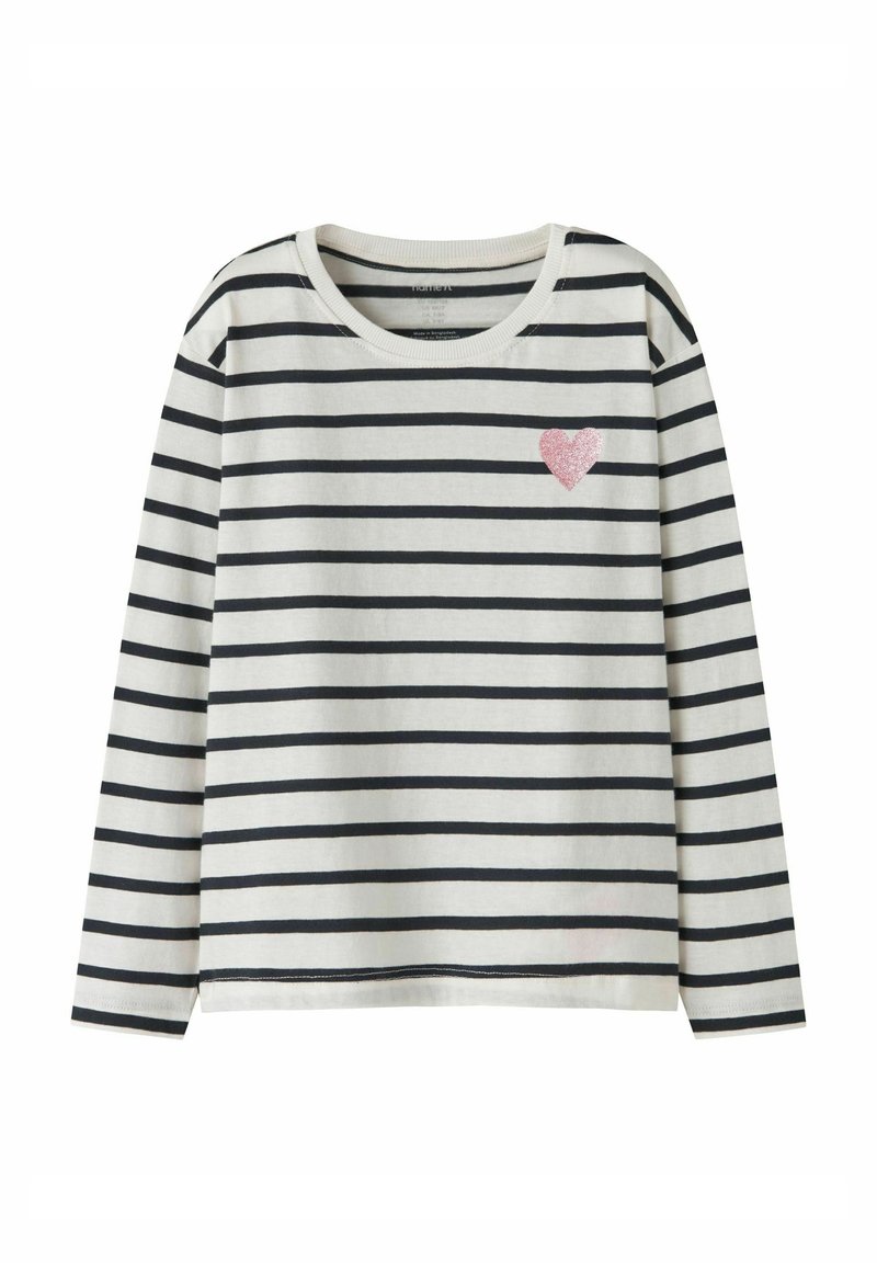 Langärmliges gestreiftes T-Shirt in Creme und Marineblau mit einem glitzernden pinkfarbenen Herz auf der linken Brust. Weiches Baumwollmaterial, Rundhalsausschnitt.