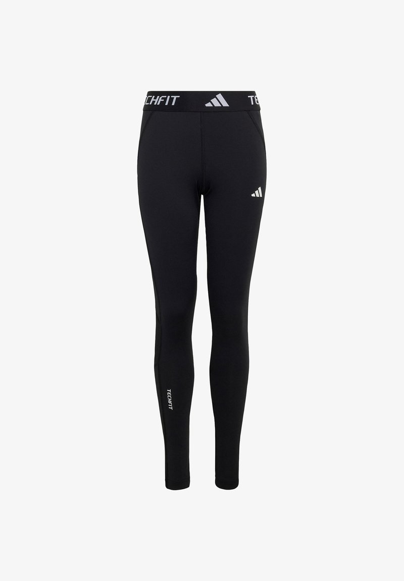 Leggings noirs Adidas Techfit moulants avec logo sur la cuisse gauche, inscription "TECHFIT" sur la ceinture et sur le bas de la jambe droite, coupe slim.