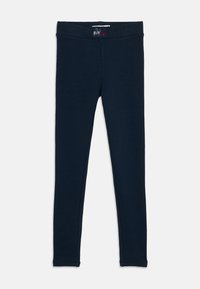 Marina leggings tillverkade av stretchtyg i en enfärgad nyans. Har en bred midja och en liten logotypdetalj med dekorativa accenter.