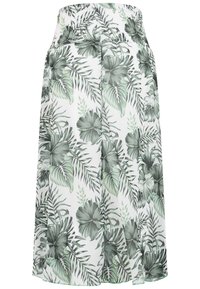 Jupe blanche longueur cheville avec imprimé feuilles tropicales vertes et fleurs d’hibiscus, taille élastique.