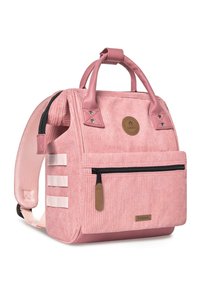 Pink corduroy backpack with synthetic leather accents, dual handles, adjustable straps, front zip pocket, and logo patch on the front.