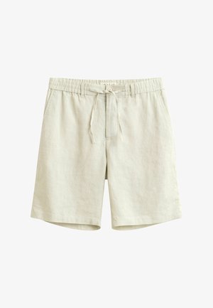 Shorts en lin beige clair avec taille élastique, lien coulissant et poches latérales, présentés sur un fond blanc.