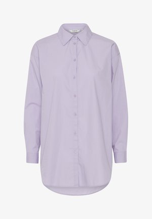 Lavendelvärviline nööpidega särk, millel on klassikaline krae, pikad varrukad ja kõveraskohaline hem. Valmistatud siledast kangast, mis on mugava lõikega.