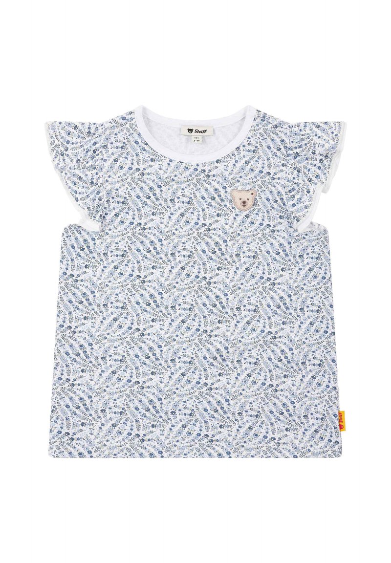 Camiseta de algodón con base blanca y patrón floral azul, con mangas con volantes y un parche de oso en el pecho.