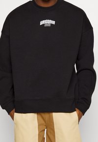 WRSTBHVR Felpa con zip - black