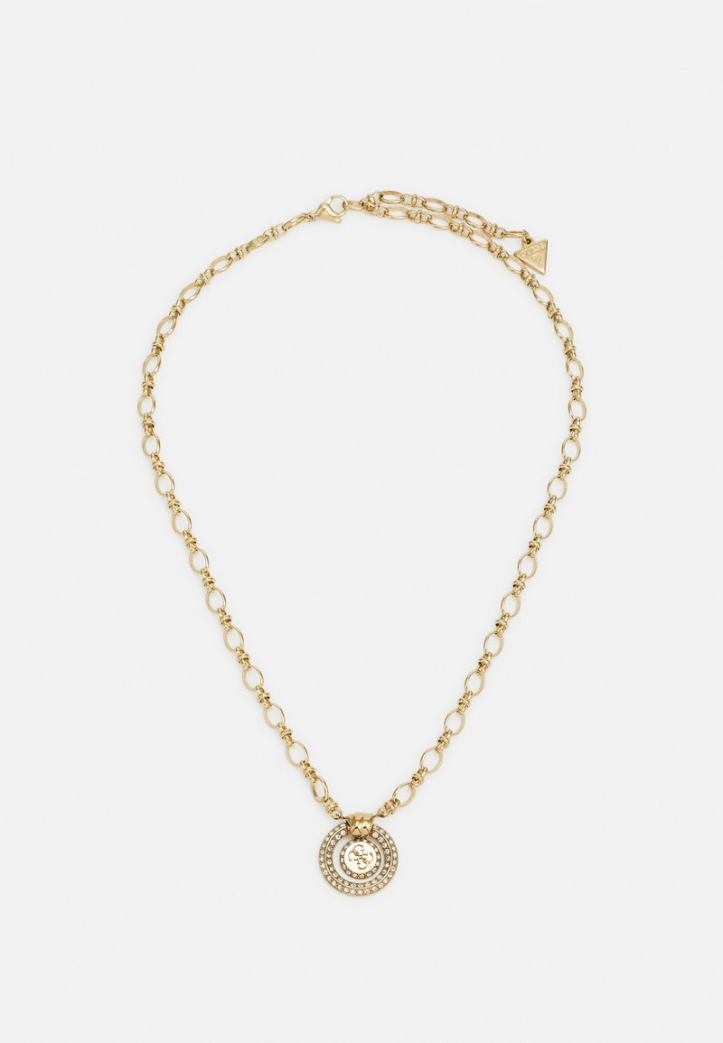 Goldene Halskette mit ovalen Gliedern und einem kreisförmigen Anhänger, der mit klaren Kristallen geschmückt ist. Sie zeigt ein geschichtetes Design mit filigranen Details.