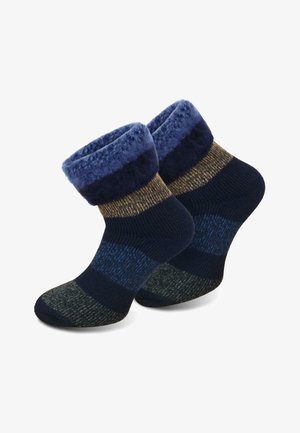 Marineblau gestreifte Socken mit einem flauschigen Bündchen. Hergestellt aus weichem Material, mit strukturierten Mustern und einer verstärkten Zehen- und Fersenkonstruktion.