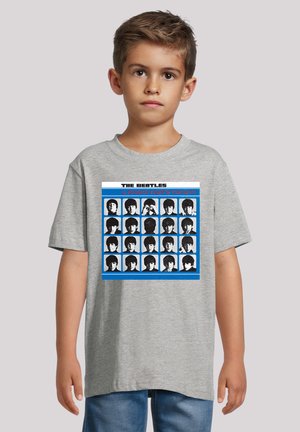 Gray cotton T-shirt featuring a graphic print of multiple black-and-white faces with blue accents and text reading "The Beatles A Hard Day's Night."