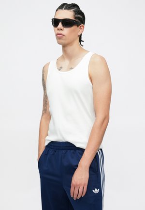 adidas Firebird Track Pants Night Indigo — foto 4