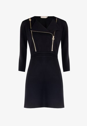 Black dress with a fitted bodice and zippered lapel detail. Features gold hardware and three-quarter sleeves. Smooth fabric texture.