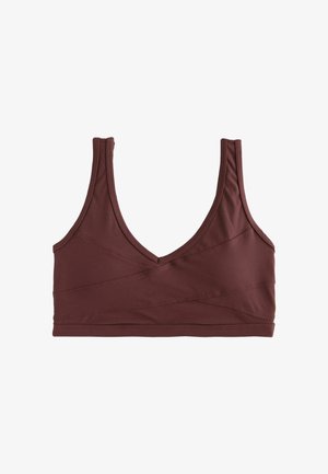 Reggiseno sportivo colore marrone, con scollatura a V, realizzato in tessuto morbido, con spalline larghe e cuciture diagonali sul davanti.