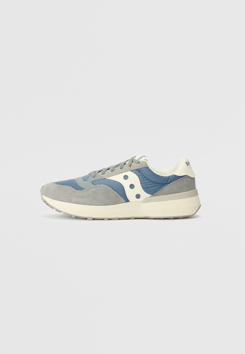 Sneakers with a blue and grey upper, made of textile and suede, featuring white accents, round laces, and a cushioned sole.