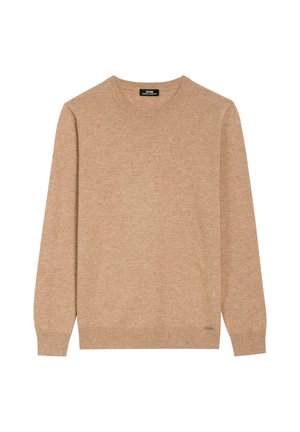 Beżowy sweter wykonany z miękkiego materiału, z okrągłym dekoltem, długimi rękawami i ściągaczami przy mankietach. Zawiera małą metkę z logo na dole.