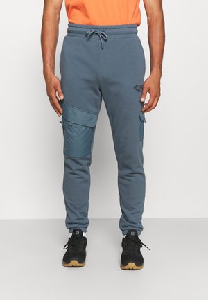 MESSNER UTILITY - Tracksuit bottoms - stormy weather