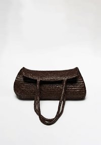 Brown woven handbag with a tubular shape, featuring two braided handles and a flap closure. Made from a textured, durable material.