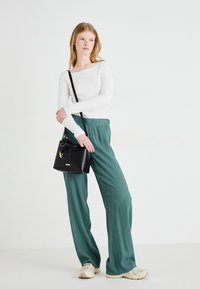 EVIELILY - Sac à main - black overflow