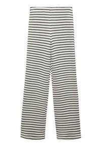 Striped wide-leg trousers in white and black cotton, featuring a textured pattern with horizontal lines of varying thickness.
