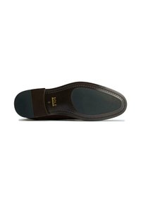 Brown suede shoe sole with a rounded toe, smooth upper edge, and textured, contrasting black rubber tread. "SOLE" is embossed in gold.