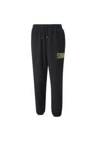Sorte sweatpants med elastisk talje, snøre og elastiske manchetter; har et grønt grafisk logo på venstre lår.