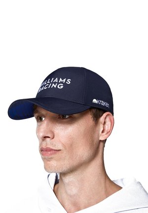 Granatowa czapka z białym napisem "WILLIAMS RACING". Posiada wzorzystą podszewkę i jest oznakowana małym białym logo po bokach.