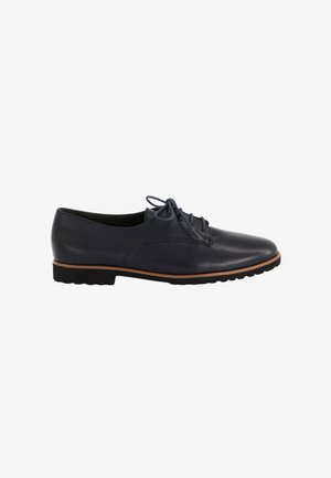 Chaussure Oxford en cuir noir à lacets avec semelle ornée marron et semelle extérieure noire rainurée, vue de côté sur fond blanc.