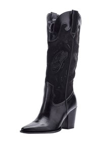 Bota de cowboy negra de altura hasta el tobillo, con materiales de cuero y ante, punta afilada, costuras decorativas y un tacón grueso.