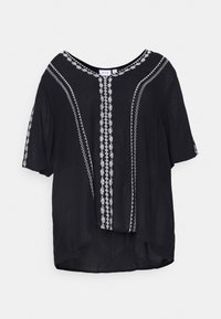 Svart lösblus i lättviktig tyg med vita broderade mönster längs fram och på ärmarna. Rundad halsringning.