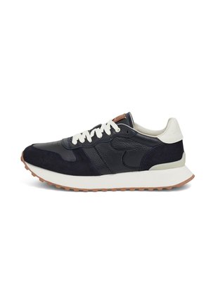 Navy blue running shoe featuring textured leather and suede, white laces, and a brown rubber outsole. Minimalist design with contrasting accents.