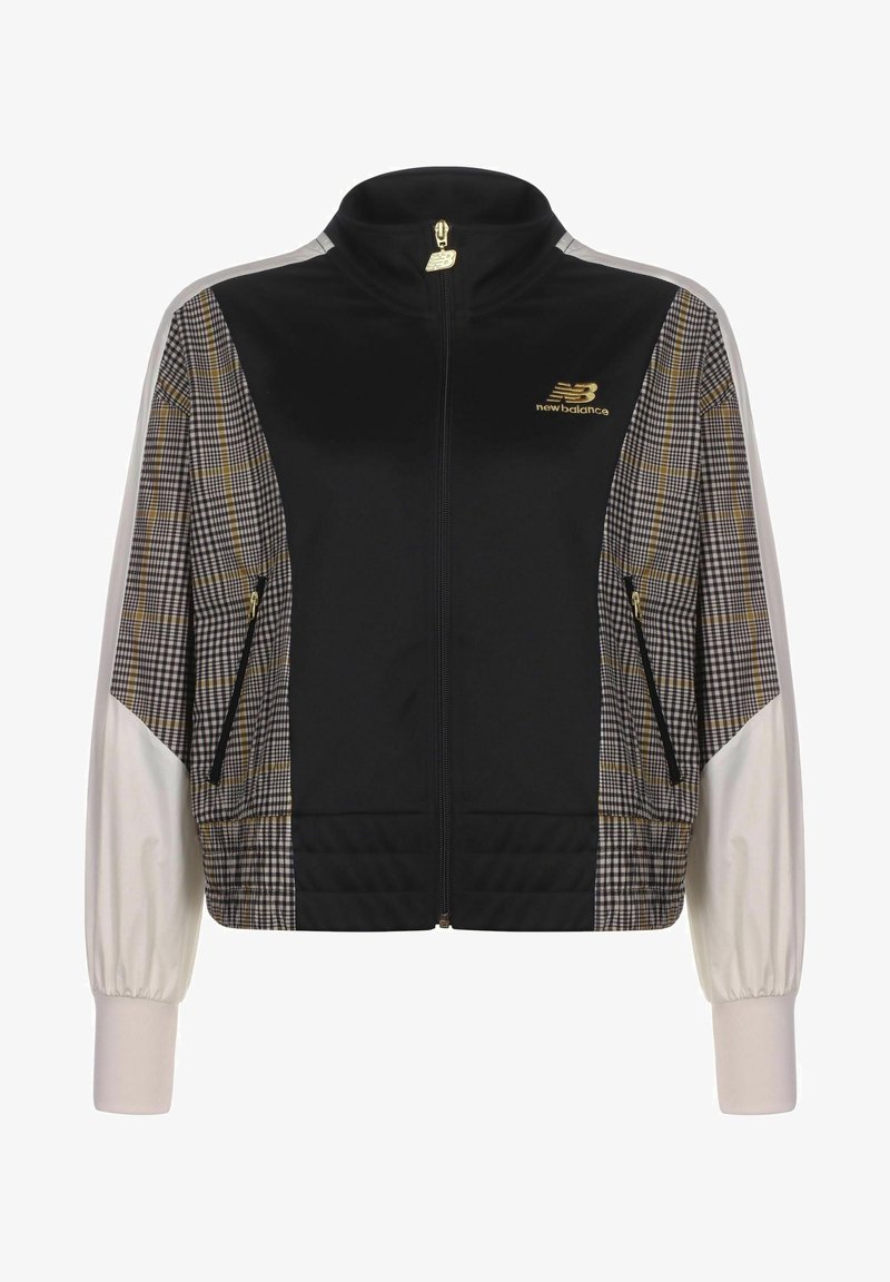 Black zip-up jacket with beige and brown plaid side panels, white long sleeves, and gold New Balance logos on chest and zipper pull.