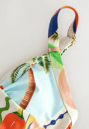Buntes Bikini-Oberteil mit tropischem Druck, der Palmen und Früchte zeigt. Inklusive verstellbarer Träger und einer goldenen Hardware-Akzent.
