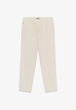 Beige casual pants with elastic waistband and drawstring, featuring side pockets and a relaxed straight-leg fit.