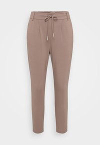 Pantalon tapered marron clair en matériau doux. Doté d'une taille élastique avec cordon de serrage, de plis et de chevilles resserrées.