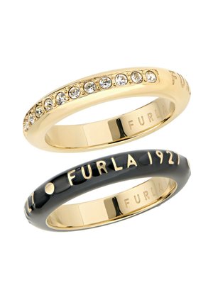Zwei Ringe: einer in Goldton mit Strasssteinen, der andere schwarz mit goldfarbener Schrift. Glatte Oberflächen mit polierten Oberflächen.
