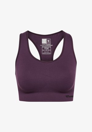 Soutien-gorge de sport violet avec un design sans coutures, doté de larges bretelles et d'une bande de soutien. Fabriqué en mélange de polyester recyclé et d'élasthanne.