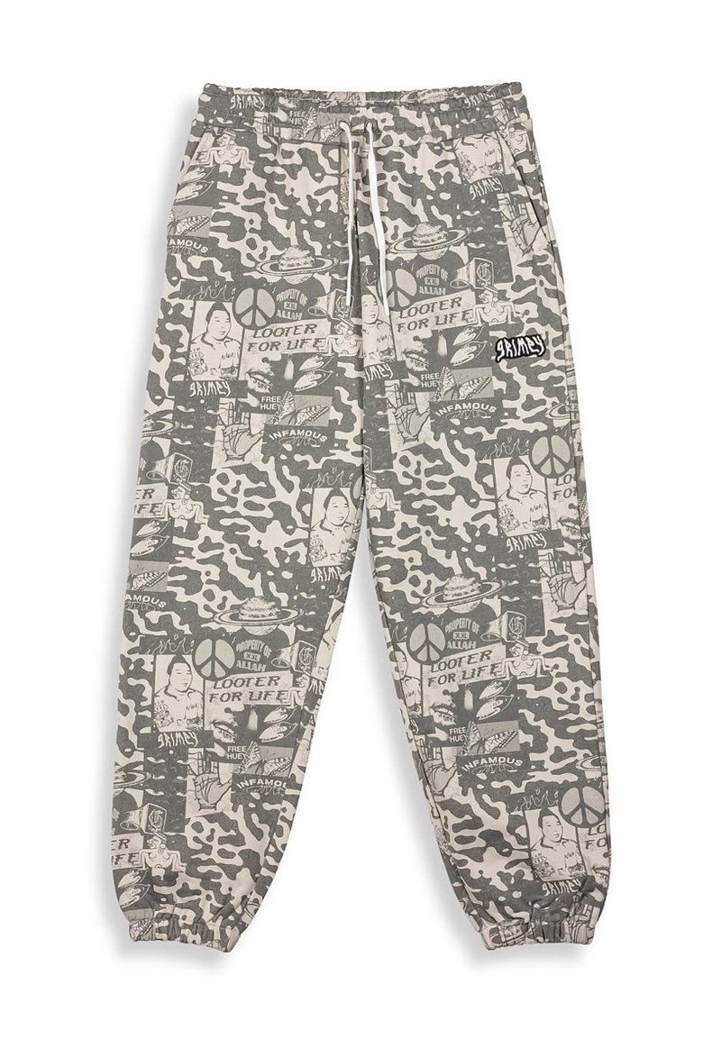 Grijze camouflage sweatpants met witte grafische prints, elastische tailleband en boorden. Bevat verschillende patronen en een klein merklogo.
