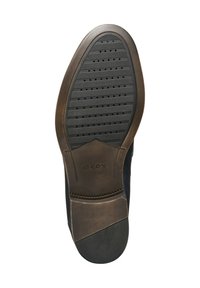 Suola di scarpa da uomo, in gomma nera con superficie texture, dotata di fori di ventilazione e di un robusto bordo marrone scuro. Logo Geox presente.