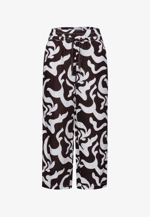 Pantalon à jambes larges avec motif abstrait en spirale noir et blanc et taille élastique avec cordon.