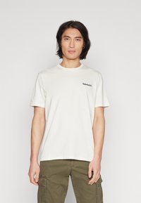 Timberland SMALL LINEAR LOGO PRINT TEE - T-shirts med print - vintage white