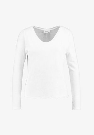 Chemise blanche à manches longues en matière douce avec un décolleté en V et un ourlet festonné, présentant une coupe décontractée et un design minimaliste.