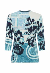 Bloemmotief top met 3/4 mouwen, in blauwe en marine kleuren op een lichte achtergrond, van gladde stof en met een ronde halslijn.