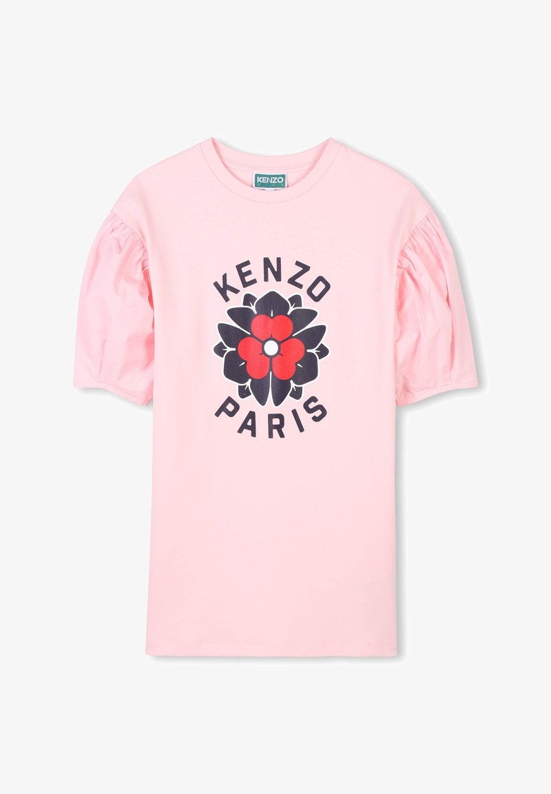 T-shirt rose avec des manches bouffantes, un design floral et le texte "KENZO PARIS" en noir et rouge. En coton doux.
