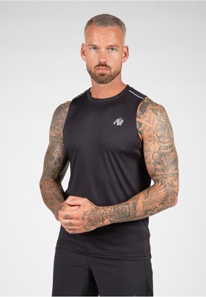Zwarte mouwloze sportshirt gemaakt van gladde stof, met een klein logo en lichtgrijze accenten op de schouders.