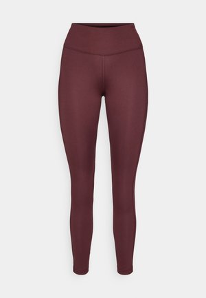 Høyt liv, hellengde leggings for kvinner i dyp burgunder med flate sømmer og glatt, elastisk stoff.