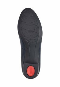 Suola di gomma nera con grip testurizzato, forma curva e un accento circolare rosso nel tallone. Taglia '37' contrassegnata vicino al bordo.