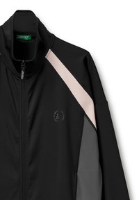 Giubbotto nero con colletto alto, caratterizzato da pannelli rosa e grigi. Texture liscia, zip completa e logo sul davanti.