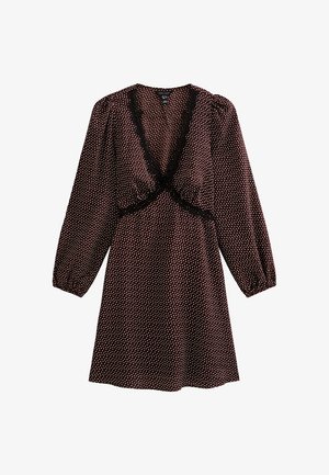 Bruin jurkje met polka dots, lange pofmouwen, diepe V-hals en zwarte kanten rand langs de halslijn en taille. Zachte stof met een ontspannen pasvorm.