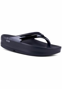 Black glossy flip-flop with a textured footbed, featuring a Y-shaped strap design and raised sole for cushioning.