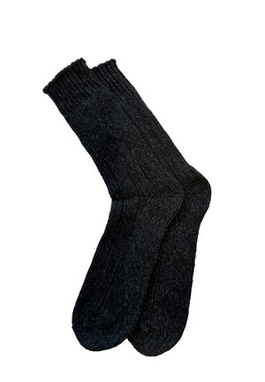 Schwarze, gestrickte Socken mit einem Rippendesign, in mittlerer Wadenlänge und einer weichen Textur. Die Enden sind leicht umgeschlagen und zeigen einen sauberen Abschluss.