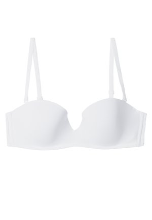 Bílá podprsenka s výztuží a nastavitelnými ramínky na bílém pozadí.