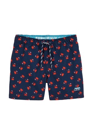 Pantaloni da bagno blu navy con un motivo ripetuto di granchi rossi. Presentano una vita elastica con cordoncino e un'etichetta con logo sulla gamba. Tessuto liscio.